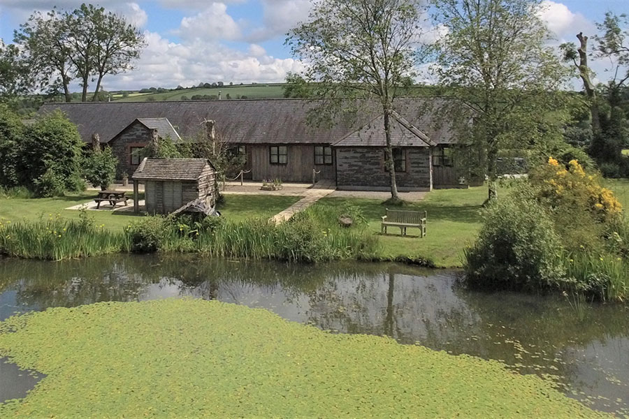 long barn cottages by the fishing lake